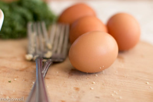 Sautéed mushrooms, onions, and French cream make this Kale, Onion, and Mushroom Quiche creamy while the kale adds a slight crunch and a crumbly almond flour crust melts in your mouth. Perfect for breakfast, brunch, lunch, and dinner! | www.megiswell.com
