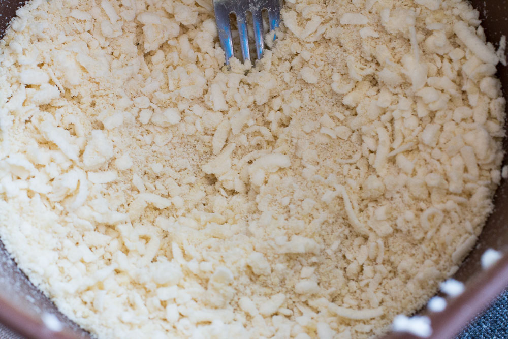Grated frozen butter mixed into the flour