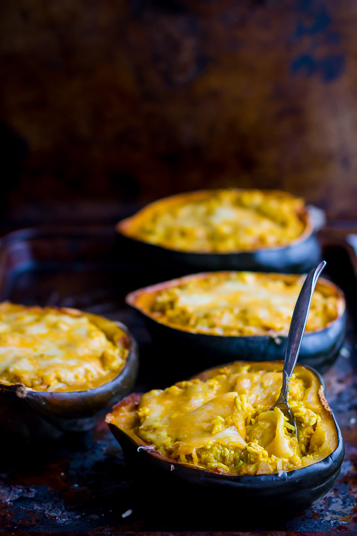 This Twice Baked Acorn Squash with Thai Yellow Curry and Chicken is extremely delicious. Yellow curry, coconut milk, shredded chicken, and jasmine rice all combine in a simple and comforting meal. | www.megiswell.com