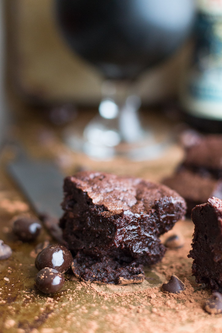 Using a stout or porter in these homemade Fudgy Beer Brownies brings out all the triple chocolaty and espresso gooey goodness. | www.megiswell.com