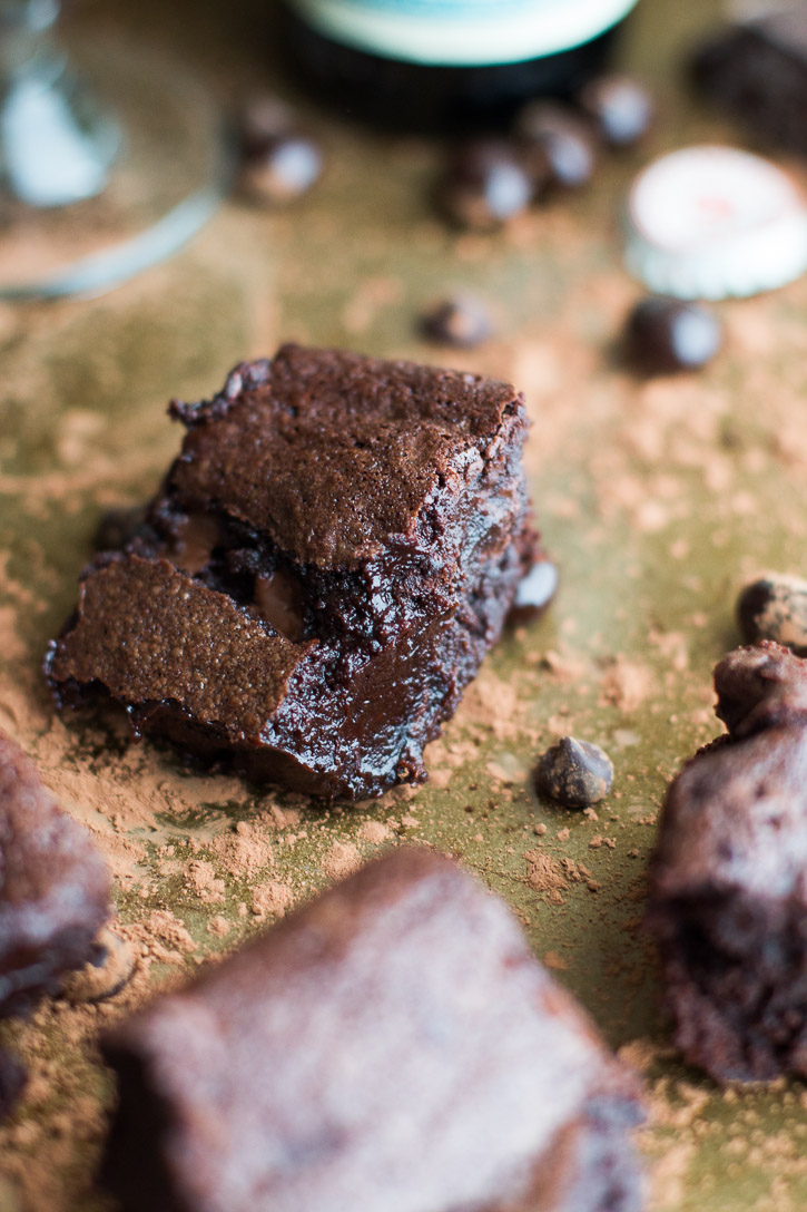 Using a stout or porter in these homemade Fudgy Beer Brownies brings out all the triple chocolaty and espresso gooey goodness. | www.megiswell.com