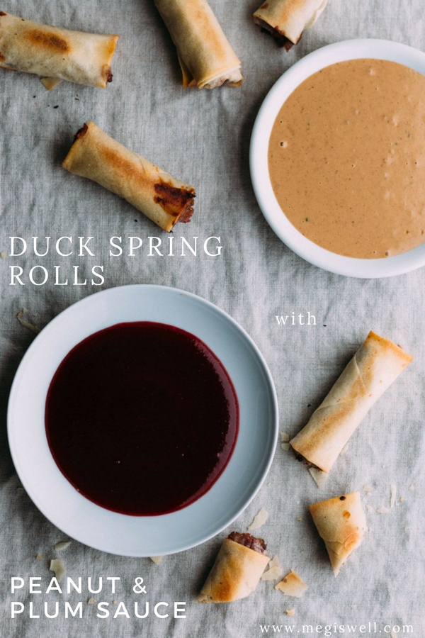 Duck and peanut sauce are wrapped up tight with a bright plum sauce in baked Chinese spring rolls for a subtle peanut butter and jelly twist. | #dimsum #appetizer #side #snack | www.megiswell.com