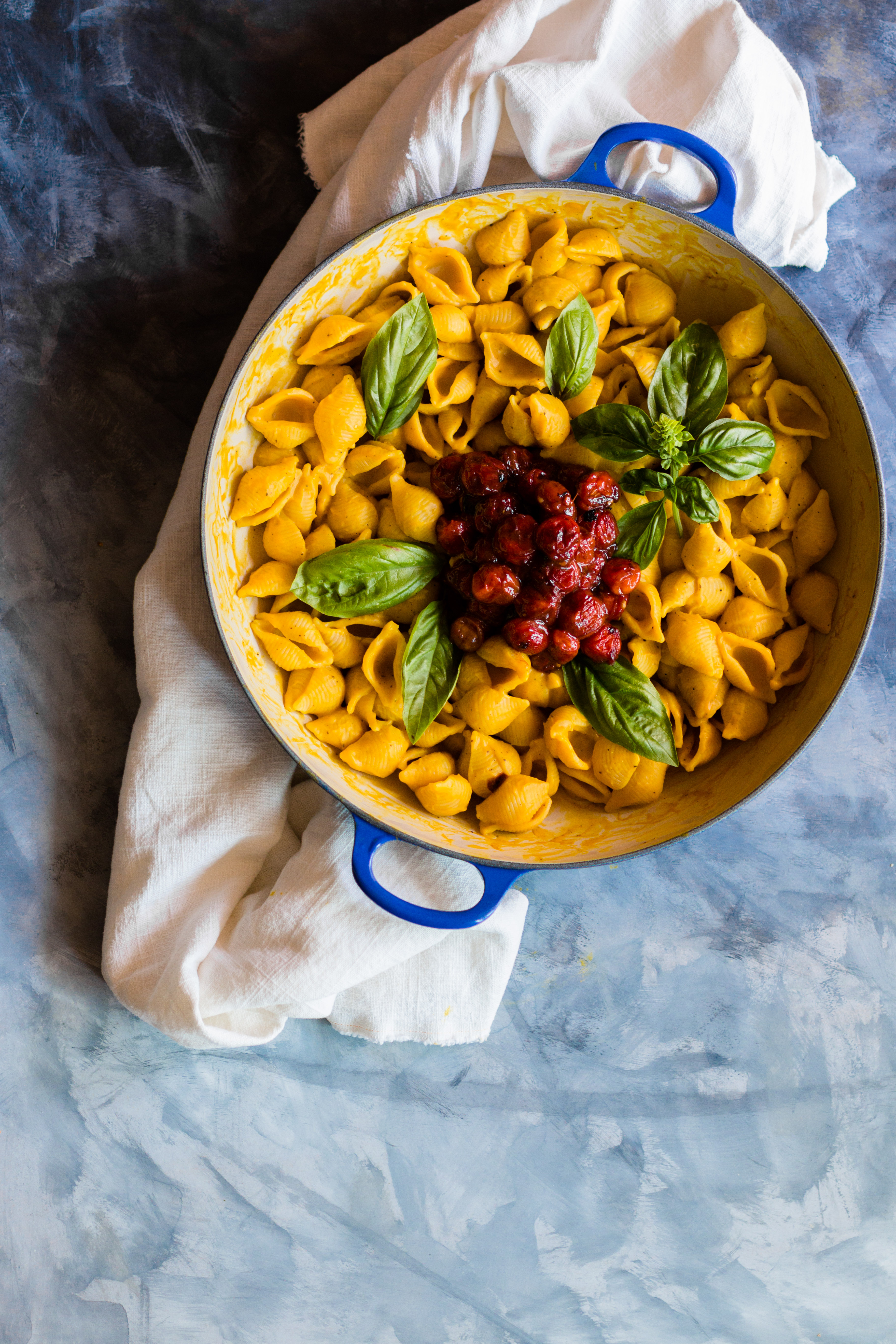 This Mac and Cheese with Vegan Pumpkin Cheese Sauce is so creamy and cheesy tasting, people will ask what kind of cheese you used. Serve with a side of slow roasted cherry tomatoes for an explosion of flavor. | #pumpkin #vegan | www.megiswell.com