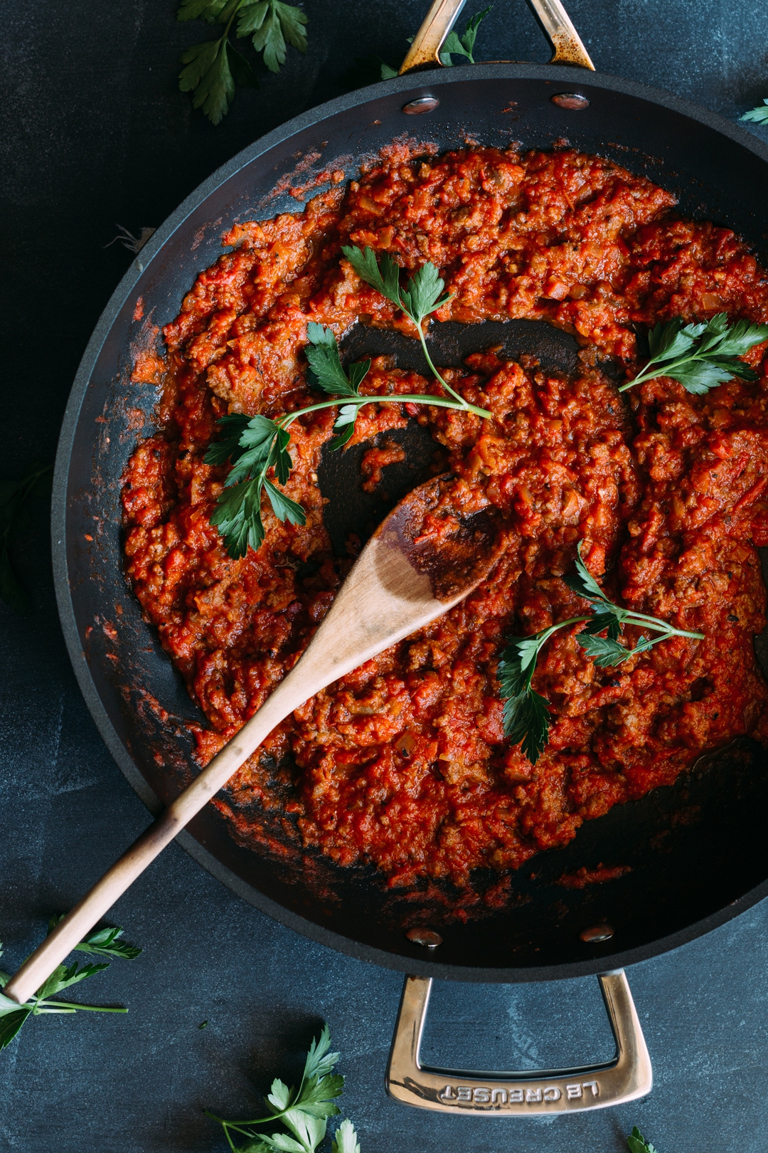 This Easy Homemade Marinara uses fire-roasted diced tomatoes, Vietnamese caramel sauce, and a sardine to get fast and easy flavor packed full of umami. #marinarasauce #homemadesauce #easy #pasta #tomatosauce | www.megiswell.com
