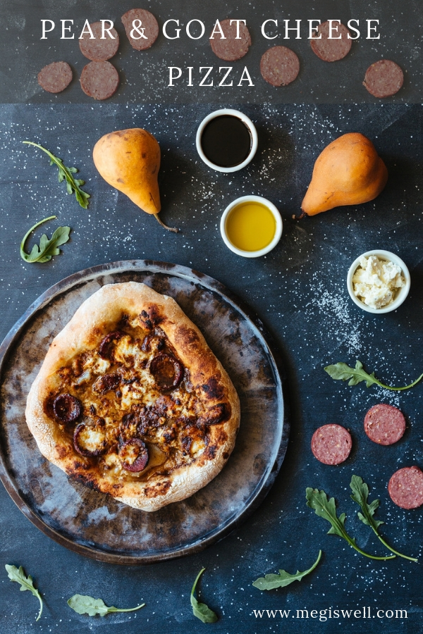 This Pear and Goat Cheese Pizza is a perfect combo of savory and sweet: fall pears, summer sausage, creamy & rich truffle goat cheese, and balsamic vinegar. It’s simple, elegant, and perfect for feeling a little fancy. | Goat Cheese Pizza | Pear Pizza | Pizza Photography | Fall Pizza | www.megiswell.com