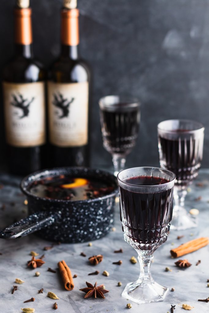 This Holiday Mulled Wine with Apple Cider and Brandy can be made on the stovetop or slow cooker and is perfect for holiday entertaining. | Christmas | Thanksgiving | crockpot | www.megiswell.com
