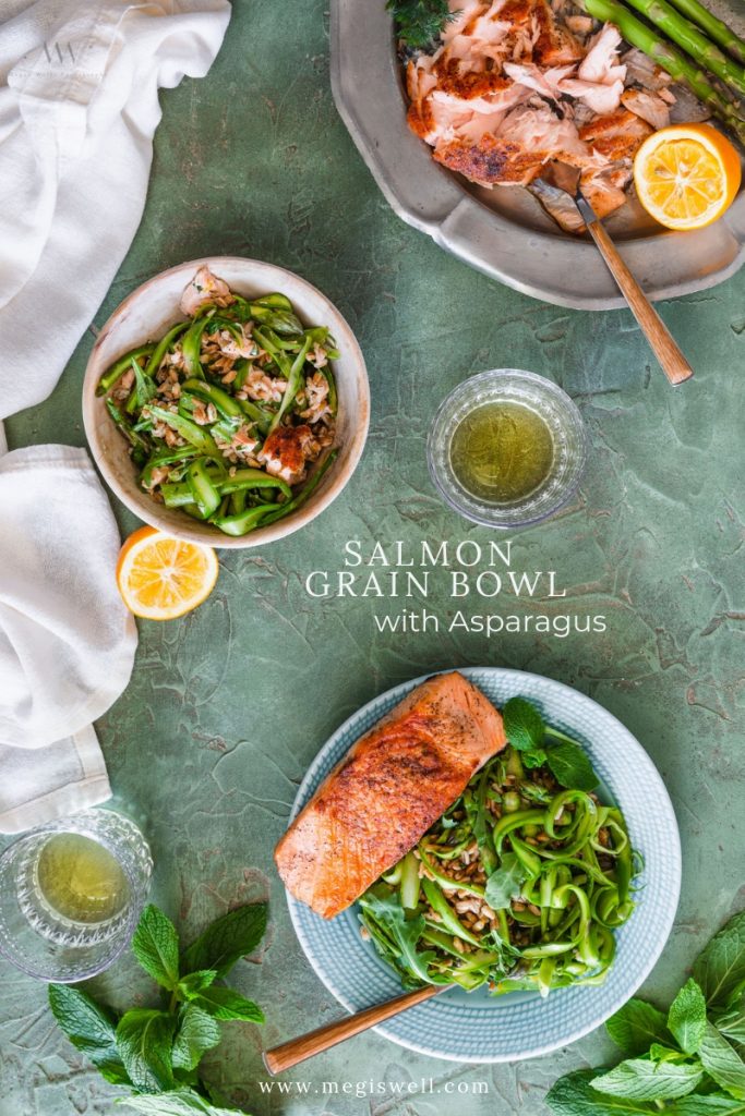 This Salmon Grain Bowl with Asparagus is high in protein and is filled with fresh herbs and citrus notes that make it a perfect spring recipe! | #salmonbowl #proteinbowl #healthydinner #megiswell #meganwellsphotography | www.megiswell.com