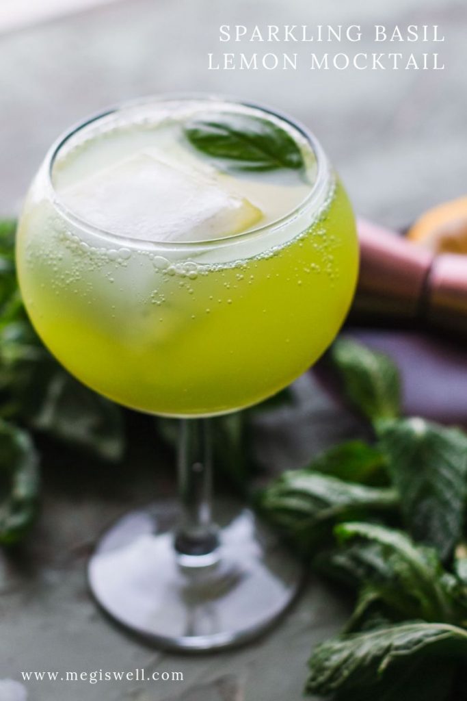 This Sparkling Basil Lemon Mocktail has flavors of basil, cardamom, lemon, and mint that will leave you with a fresh sparkle. | Non Alcoholic | Summer Drinks | Shrub Mocktail | #mocktail #megiswell #meganwellsphotography | www.megiswell.com