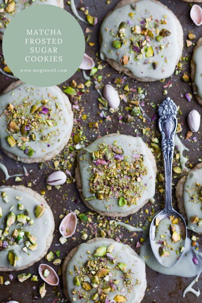 These Matcha Frosted Sugar Cookies are soft, sweet, and romantic in both taste and looks, making them perfect for Valentine’s Day. | Easy Vegan Cookie Recipe | Pistachios | Raw Cacao Butter | #vegancookies #matchafrosting | www.megiswell.com