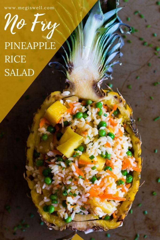 This easy No-Fry Pineapple Rice Salad is a simple side perfect for summer parties. | Cold Rice Salad | Pineapple Bowl | Vegetarian | Vegan | www.megiswell.com